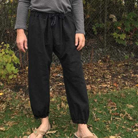 Black with Black Stitching and Black Drawstring, No Pockets, Cinched Cuffs Black with Black Stitching and Black Drawstring, No Pockets, Cinched Cuffs