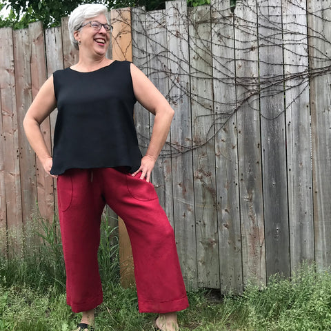 Model is 5'6.5" or 169cm | SLEEVELESS TUNIC Colour/Size/Length: Black/Large/Shorter | TOWN PANT Colour/Cut/Length: Dark Cranberry/Extra-Roomy Cut/Length 1